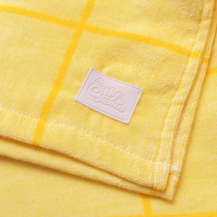 Poncho de bain enfant - jaune à grands carreaux